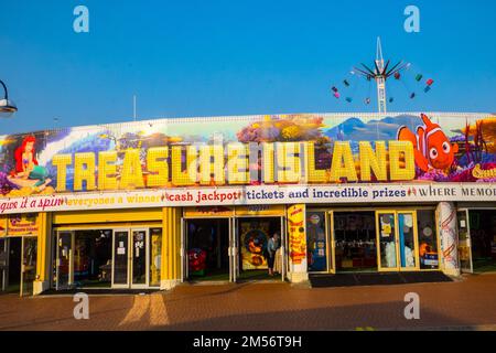 Treasure Island,amusements,at,in,Barry,Barry Island,Barry Island is a district, peninsula and, seaside, resort, forming part of the town of Barry in the, Vale of Glamorgan, South Wales. It is named after the 6th century Saint Baruc.Wales,Welsh,United Kingdom,UK,Great Britain,British,Europe,European Stock Photo