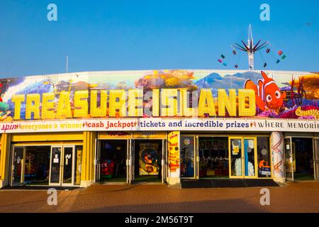 Treasure Island,amusements,at,in,Barry,Barry Island,Barry Island is a district, peninsula and, seaside, resort, forming part of the town of Barry in the, Vale of Glamorgan, South Wales. It is named after the 6th century Saint Baruc.Wales,Welsh,United Kingdom,UK,Great Britain,British,Europe,European Stock Photo