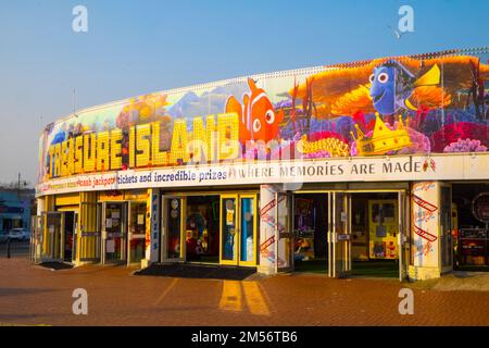 Treasure Island,amusements,at,in,Barry,Barry Island,Barry Island is a district, peninsula and, seaside, resort, forming part of the town of Barry in the, Vale of Glamorgan, South Wales. It is named after the 6th century Saint Baruc.Wales,Welsh,United Kingdom,UK,Great Britain,British,Europe,European Stock Photo