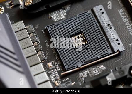 Punta Cana Dominican republic - 17.10.2022 Close up of the AM4 socket for the motherboard black color covered in dust. Socket am4. Stock Photo