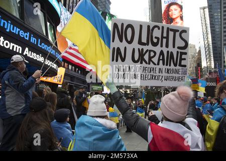 Support Ukraine Rally in Times Square a week before Christmas in New York CIty 2022. Stock Photo