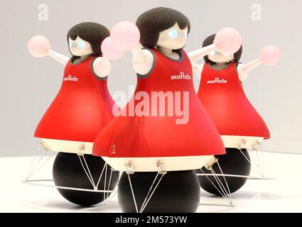 Yokohama, Japan. 26th Dec, 2022. Cheerleading robots of Japanese electronic parts maker Murata balance on the black balls and perform dancing at a preview of their two-day performance at the company's facility in Yokohama, suburban Tokyo on Monday, December 26, 2022. The 36cm tall Murata cheerleaders equipped with the company's sensors calculate center of gravity to keep balance and recognize each positions with ultrasonic and infrared sensors. Credit: Yoshio Tsunoda/AFLO/Ģ����ý Live News Stock Photo
