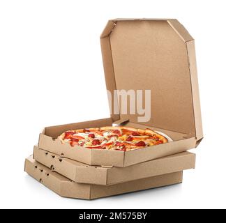 Stack of cardboard boxes with tasty pizza isolated on white background Stock Photo