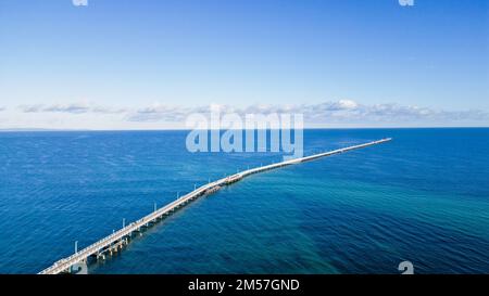 An aerial view of the Busselton Jetty on a sunny day in Busselton, Australia Stock Photo