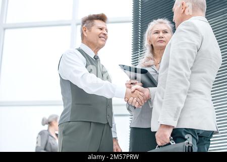 close up. business people confirming the deal with a handshake Stock Photo