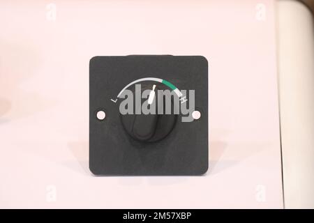 Knob switch that uses a potentiometer for its working for setting values between maximum and minimum Stock Photo