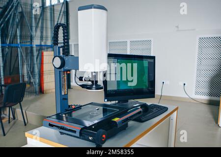 computer technology in the office. Technology HUD hologram and a woman taking notes. Development of programmers Team Development Website design and coding technologies Work in the office of a software development company.  Stock Photo