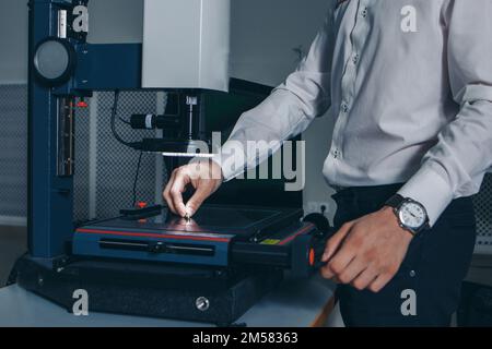 computer technology in the office. Technology HUD hologram and a woman taking notes. Development of programmers Team Development Website design and coding technologies Work in the office of a software development company.  Stock Photo