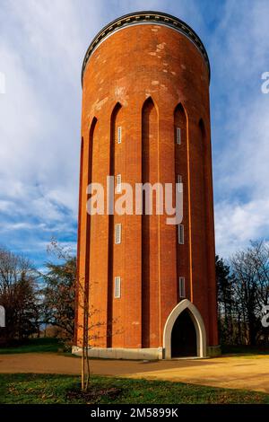 Brick-built constructed circular water tower. Rue du 6 Février 1945. Ensisheim, Alsace, France. Stock Photo