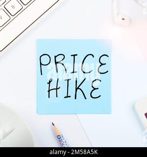 Writing displaying text Price Hike. Word for sum of values that customer gives up to gain the benefits of having Stock Photo