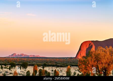 Sunrise at The Olgas Kata Tjuta and Uluru Ayers Rock. Northern Territory. Australia. Stock Photo