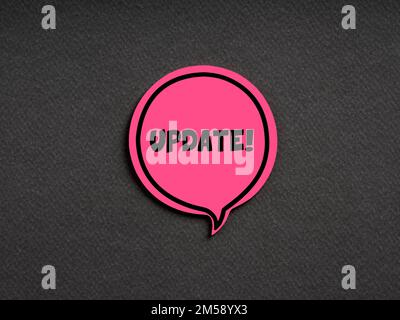 The word update on pink speech bubble on black background. Technology update or upgrade information announcement concept. Stock Photo