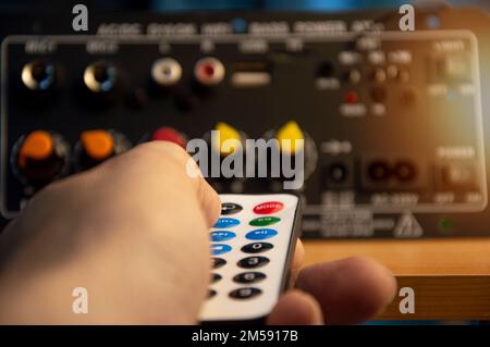 Using the remote control bluetooth power amplifier power amplifier mini bluetooth Stock Photo