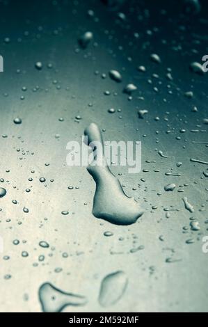 abstract background of drops of water on metal surface Stock Photo
