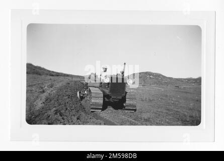 Original caption: 'New 'WM' Allis-Chalmers tractor and equipment purchased by the Barona Group of the Capitan Grande Indians'. 1936 - 1942. Pacific Region (Riverside, CA). Photographic Print. Department of the Interior. Office of Indian Affairs. Mission Agency. 11/15/1920-6/17/1946. Photographs Stock Photo