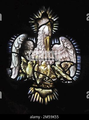 Stained glass window by Percy Bacon & Brothers depicting The Pelican in its Piety, St Chad's Church, Bensham, Gateshead Stock Photo