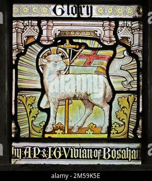 Stained glass window by Heaton Butler & Bayne depicting the Lamb of God, St Anthony's Church, St Anthony in Meneage, Cornwall Stock Photo