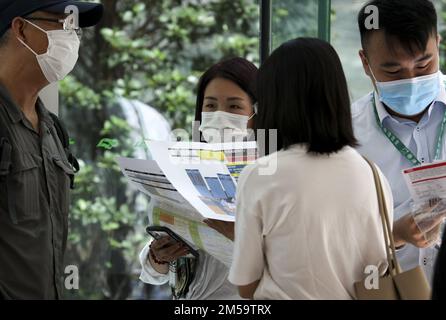 Potential home buyers line up at the sales office in International Commerce Centre (ICC), Kowloon Station for 108 units at Regency Bay by Sun Hung Kai Properties (SHKP).  25JUL20 SCMP/ Xiaomei Chen Stock Photo