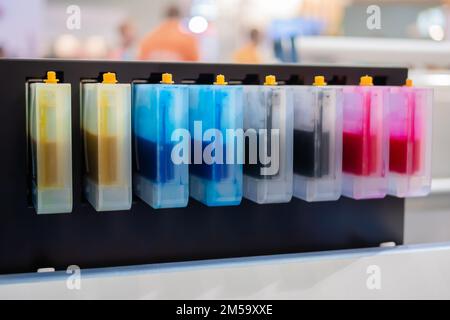 Row of inkjet printer CMYK cartridges - close up Stock Photo