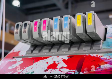 Row of inkjet printer CMYK cartridges - close up Stock Photo