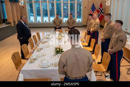 OSLO, Norway (Feb. 14, 2022) — Secretary of the Navy Carlos Del Toro speaks about his career in the U.S. Navy and his current role with U.S. Marines assigned to Marine Security Guard, Detachment Oslo in Oslo, Norway, Feb. 14, 2022. Secretary Del Toro is in Norway to visit U.S. service members and Norwegian government leaders to reinforce existing bilateral and multilateral security relationships between the U.S. Navy and the Royal Norwegian Navy. Stock Photo