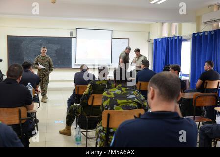 MOMBASA, Kenya (Feb. 14, 2022) – U.S. Marines, assigned to Fleet Anti-terrorism Security Team Company, Central (FASTCENT) and Europe (FASTEUR), conduct classroom instruction on Visit, Board, Search, and Seizure (VBSS) training during International Maritime Exercise/Cutlass Express (IMX/CE) 2022 in Mombasa, Kenya, Feb. 14. IMX/Cutlass Express 2022 is the largest multinational training event in the Middle East, involving more than 60 nations and international organizations committed to enhancing partnerships and interoperability to strengthen maritime security and stability. Stock Photo