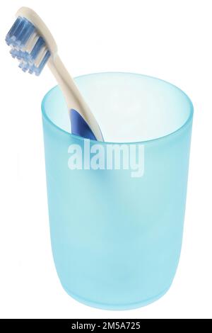toothbrush in tooth mug isolated on white background Stock Photo