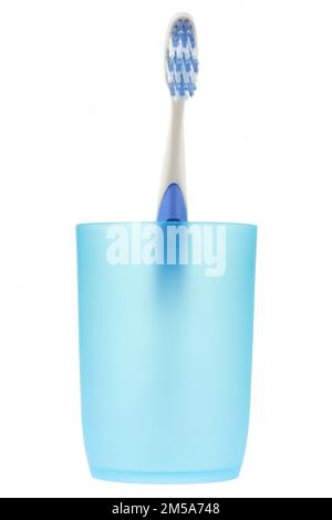 toothbrush in tooth mug isolated on white background Stock Photo