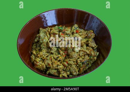 Isolated southern stir-fried pork with yellow curry paste Stock Photo