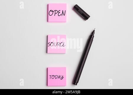 Handwriting text Open Source. Word for denoting software which original source code freely available Stock Photo