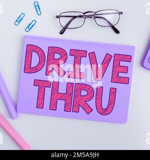 Hand writing sign Drive Thru. Conceptual photo place where you can get type of service by driving through it Stock Photo