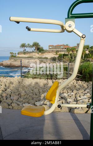 Excercise machine on the promenade walkway by the seafront in Costa Adeje, Las Americas, Tenerife, Canary Islands, Spain Stock Photo