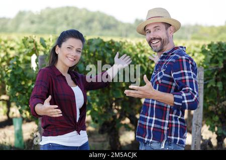 portrait of happy farmer couple in the vineyard Stock Photo