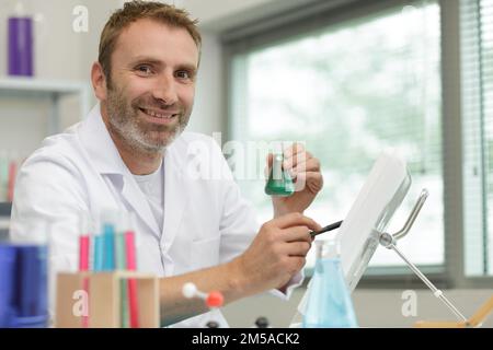 portrait of male scientist working in lab Stock Photo