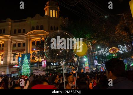 Kolkata, West Bengal, India - 26.12.2018 : Decorated balloon, lights and Christmas celebration at illuminated Park street with joy and year end. Stock Photo