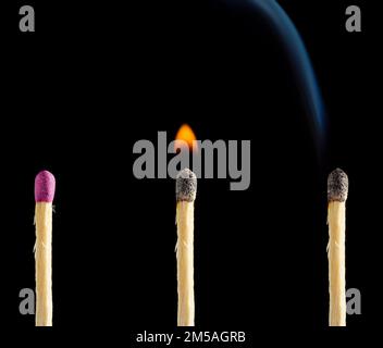 Set of whole, lit and extinguished matches isolated on black background Stock Photo