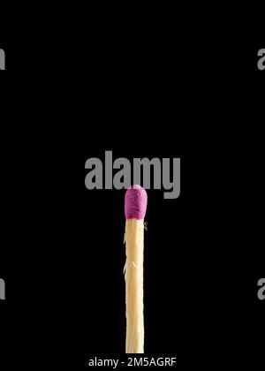 Whole wooden matchstick isolated on black background Stock Photo