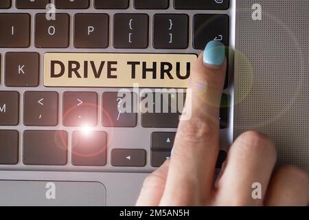 Writing displaying text Drive Thru. Concept meaning place where you can get type of service by driving through it Stock Photo