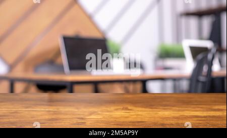 Blurred office background with modern workplaces and wooden desk, wood table. High quality photo Stock Photo
