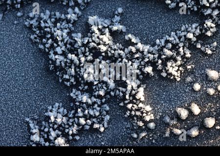 Ice patterns on car bonnet Stock Photo