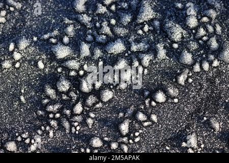 Ice patterns on car bonnet Stock Photo