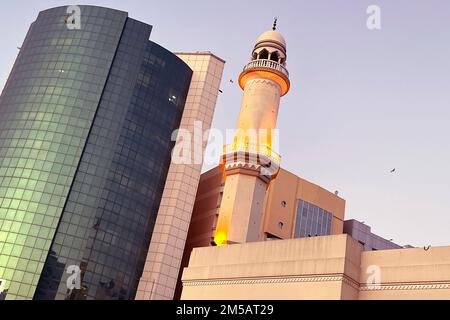 Impressions from Doha/Qatar on December 2nd, 2022. Tower of a mosque in Doha. Soccer World Cup 2022 in Qatar from 20.11. - 18.12.2022 ? Stock Photo