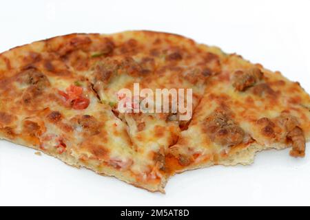 Italian Pizza topped with mozzarella cheese and shrimps, tomatoes and vegetables, Italian cuisine of slices of pizza seafood shrimp ready to be served Stock Photo