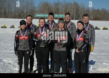 The North Dakota National Guard biathlon team from back row left to right Capt Blake Hillerson, 1st Battalion, 112 Aviation Regiment, Staff Sgt. Brandon Pulst, Camp Grafton Training Center, Chief Warrant Officer 2 Wynn Roberts, Company D, 1st Battalion, 112 Aviation Regiment, Staff Sgt. Joshua Warmbold, of the 141 Maneuver Enhancement Brigade, front row, Senior Master Sgt. Danelle Card, of the 119th Wing, Spc. Sydney Kautz, of the 188th Engineer Company, 2nd Lt. Kandis Matelski, of the 141 Maneuver Enhancement Brigade, and 2nd Lt. Kaitlyn Gura, of the 1,188th Air Defense Artillery Regiment. Th Stock Photo