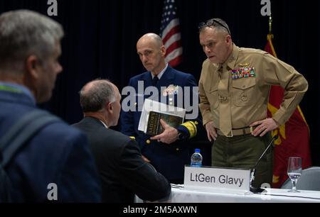 U.S. Marine Lt. Gen. Matthew G. Glavy, the deputy commandant for information, talks to government officials during the West 2022 Conference at the San Diego Convention Center in San Diego, California, Feb. 17, 2022. Throughout West 22, leaders from the Navy, Marine Corps and Coast Guard discussed modernization efforts and future concepts that support the Sea Services' operations. West 22 provides a venue for senior military and government officials to gain valuable direct feedback from operators and partners in the industry. Stock Photo