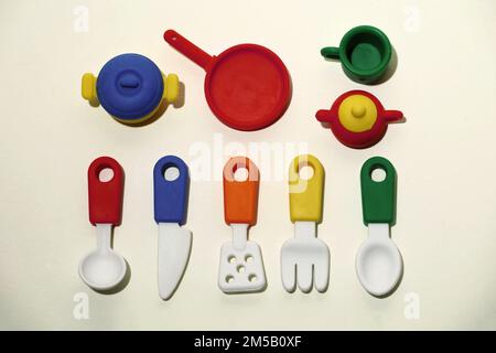 Still life shot with top down view of colorful cookware miniatures Stock Photo