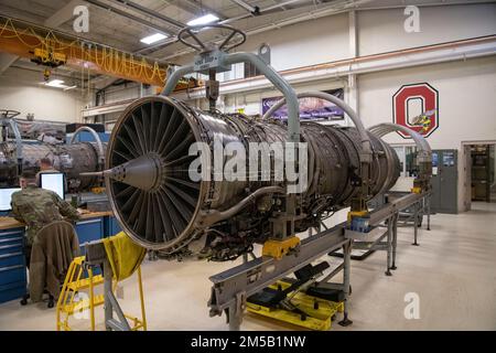 An F-16 Fighting Falcon engine sits on a maintenance stand during an engine inspection at the Ohio National Guard’s 180th Fighter Wing in Swanton, Ohio, Feb. 17, 2022. The 180FW Propulsion Element was the first to implement a Pratt and Whitney 229 and 220 engine contract field team, providing war-ready engines to Combatant Commanders, in support of the Air Force and Air National Guard.  (U.S. Air National Guard by Staff Sgt. Kregg York) Stock Photo