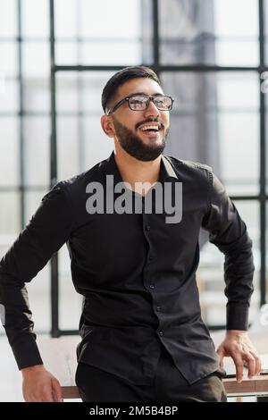 portrait of a young businessman who is smiling Stock Photo