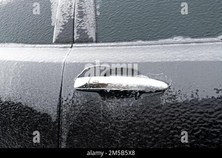 Frozen car from winter rains. Stock Photo