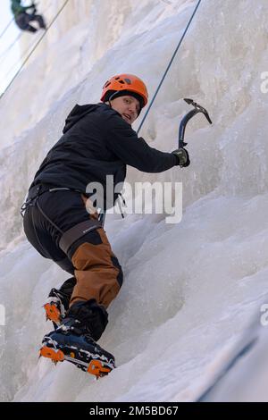 Cpl. Juan Zanella, an Army small arms/artillery repairer, assigned to 404th Aviation Support Battalion, 4th Combat Aviation Brigade, 4th Infantry Division, poses for a photo while ice climbing during a Better Opportunities for Single Soldiers program and Outdoor Recreation Center ice climbing event, Feb. 18-19, 2022, at Ouray, Colorado. During the event, Soldiers learned how to work together as a team – ice climbing, tying knots and bonding with other Soldiers. Stock Photo